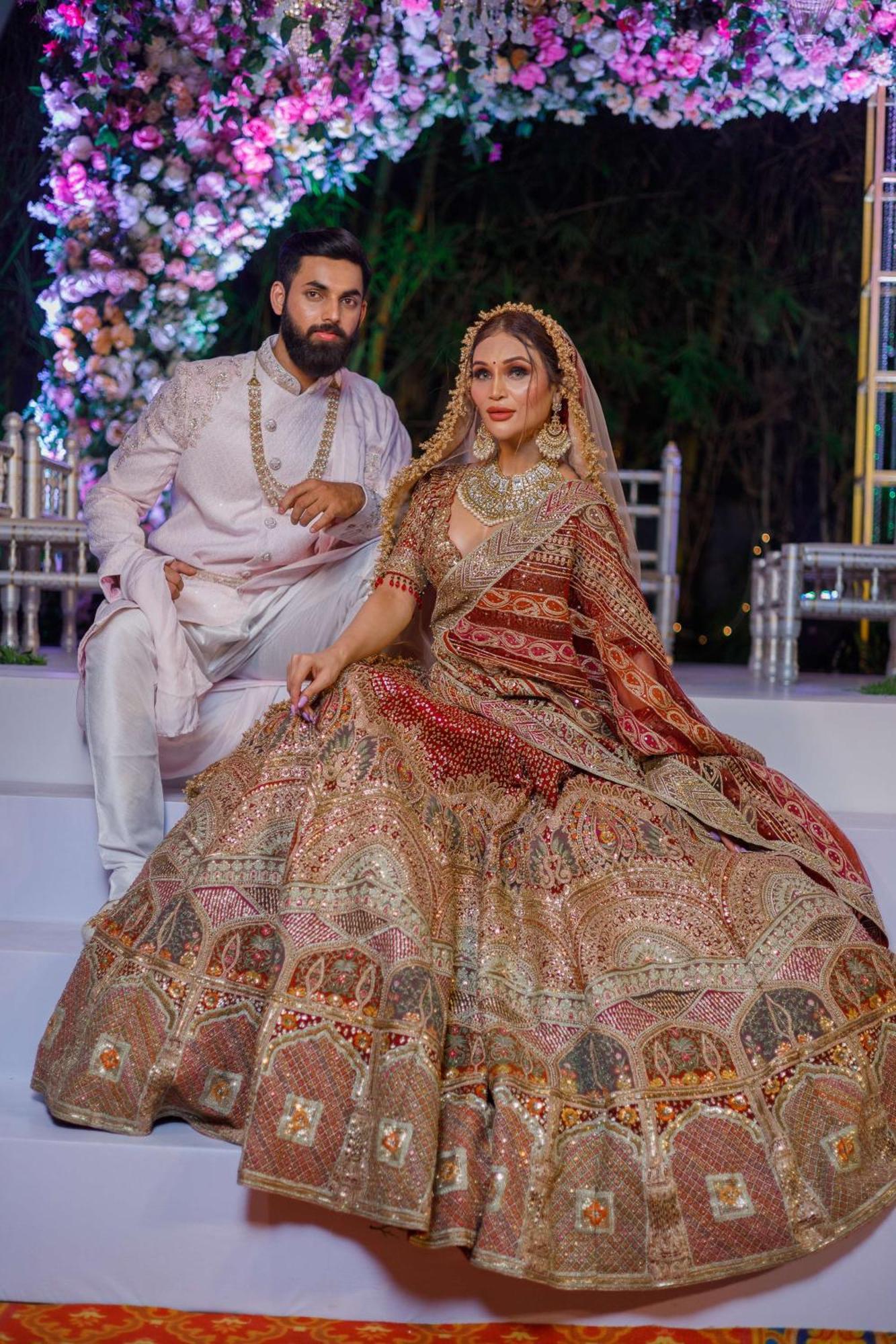 Radisson Blu Hotel Pune Kharadi Exterior photo A Pakistani couple in traditional wedding attire